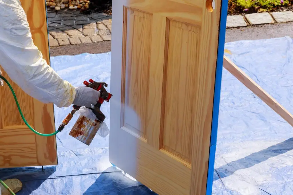 homeguide contractor painting interior door outside